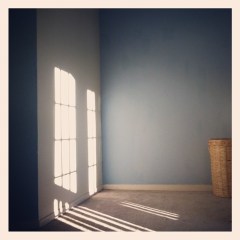 Contemplating bloggery in my bedroom. 